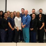 Group picture of ultrasound students with Dr. Paul Riesenman