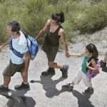 Family hiking on a trail